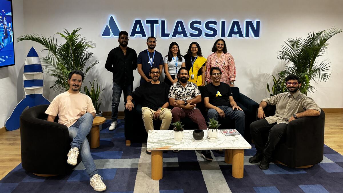 Photo of Atlassian team behind the event